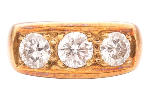 Lot 72 - A Diamond three stone ring in 14ct gold,...