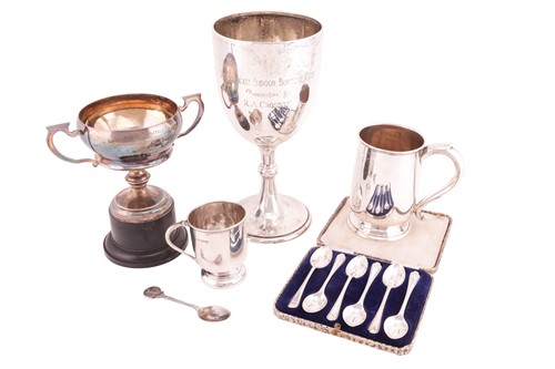 Lot 91 - Two silver trophy cups, two mugs, a cased set...