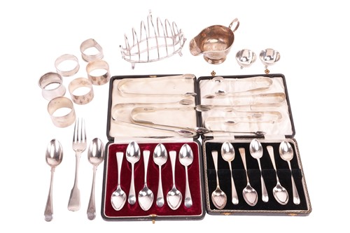 Lot 85 - A quantity of silver items comprising a toast...