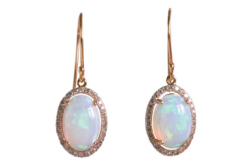 Lot 125 - A pair of opal and diamond halo drop earrings,...