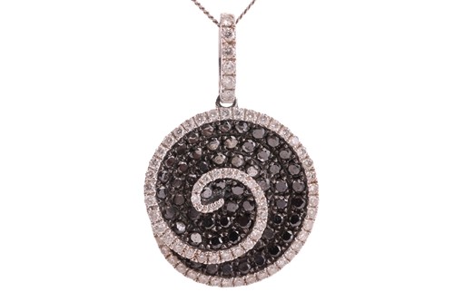 Lot 118 - A black diamond-set spiral pendant, set with a...