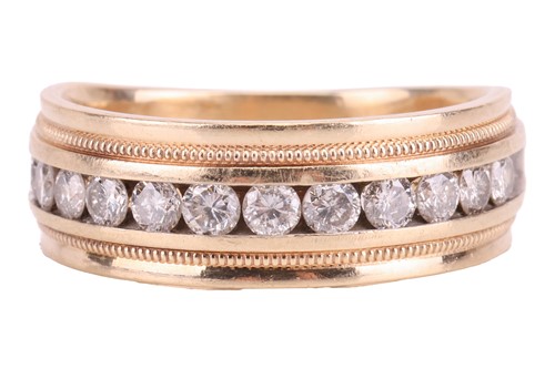 Lot 29 - A diamond half hoop ring, set with a row of...