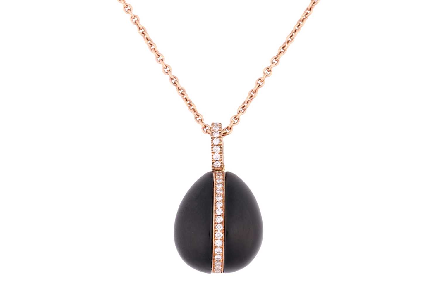 Lot 33 - A Fabergé Whitby jet and diamond egg pendant,...