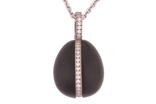 Lot A Fabergé Whitby jet and diamond egg pendant,...