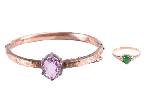 Lot 162 - A Victorian amethyst hinged bangle in 9ct gold,...