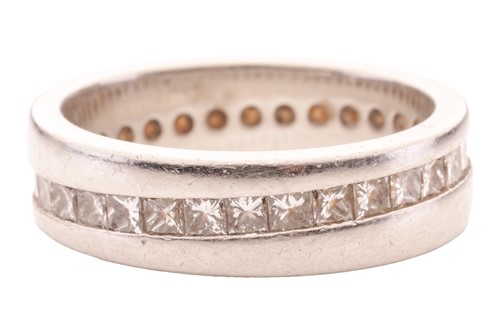 Lot 62 - A diamond-set full eternity ring in platinum,...