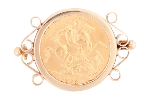 Lot 124 - A sovereign set in a brooch fitting, the 1968...