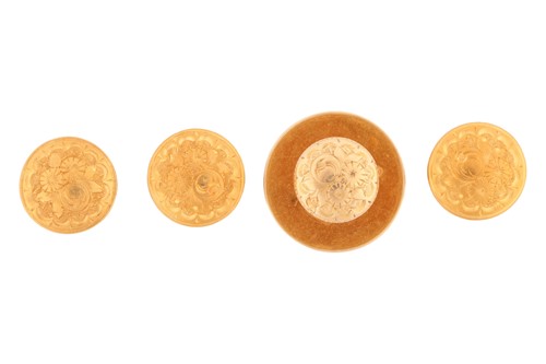 Lot 126 - Three matching shirt studs and one larger stud...