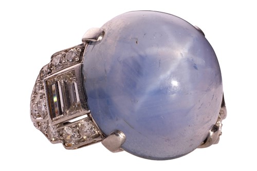 Lot A star sapphire and diamond ring, circa 1950s,...