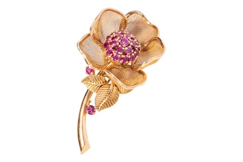 Lot A ruby flower brooch, French circa 1950s, by...