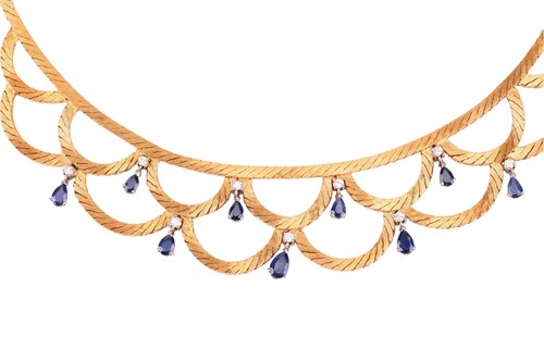 Lot 75 - A sapphire and diamond necklace, designed as a...