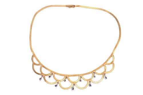 Lot 75 - A sapphire and diamond necklace, designed as a...