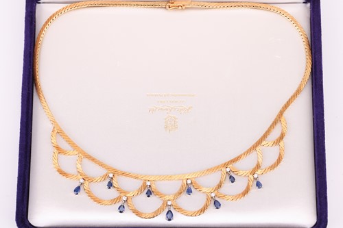 Lot 75 - A sapphire and diamond necklace, designed as a...