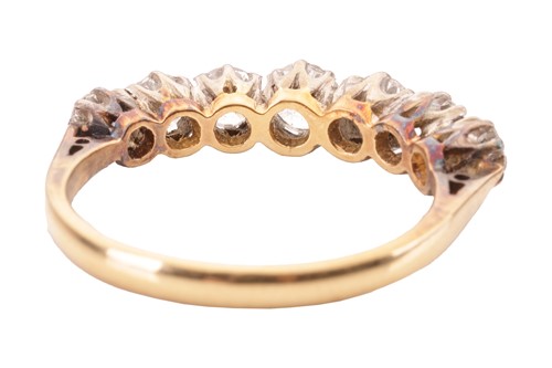 Lot 29 - A seven-stone diamond ring, featuring seven...