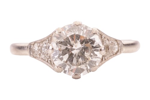 Lot An early 20th century diamond solitaire ring,...