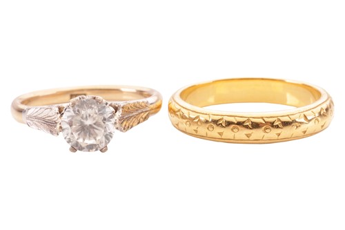 Lot 157 - A 22ct yellow gold wedding band, together with...