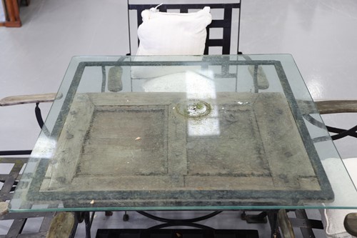 Lot 223 - A square blacksmith-made, black wrought iron...