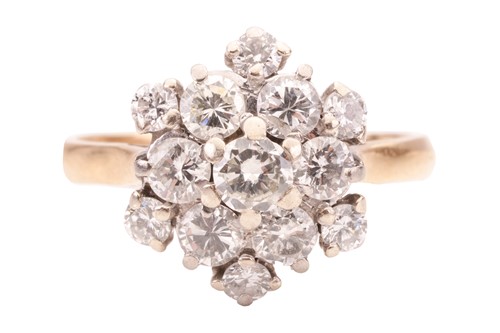 Lot 57 - A diamond cluster ring, set with a cluster of...