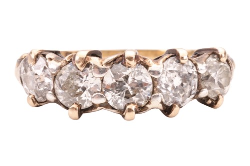 Lot 109 - A diamond five stone half hoop ring, set with...