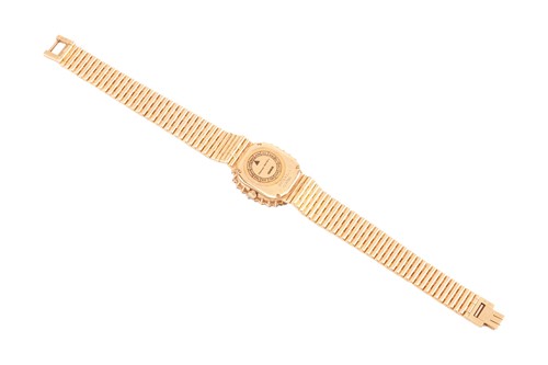 Lot 172 - A Piaget Diamond set dress watch in 18ct gold....