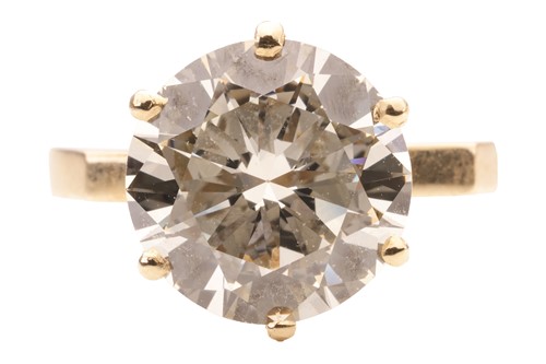 Lot A diamond solitaire ring, featuring a...