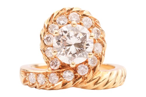Lot An asymmetrical diamond-set dress ring,...