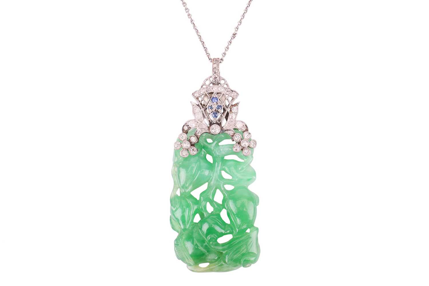 Lot 41 - An Art Deco carved jade pendant with...
