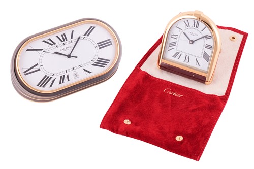 Lot Cartier. A gilt brass and enamel alarm clock;...