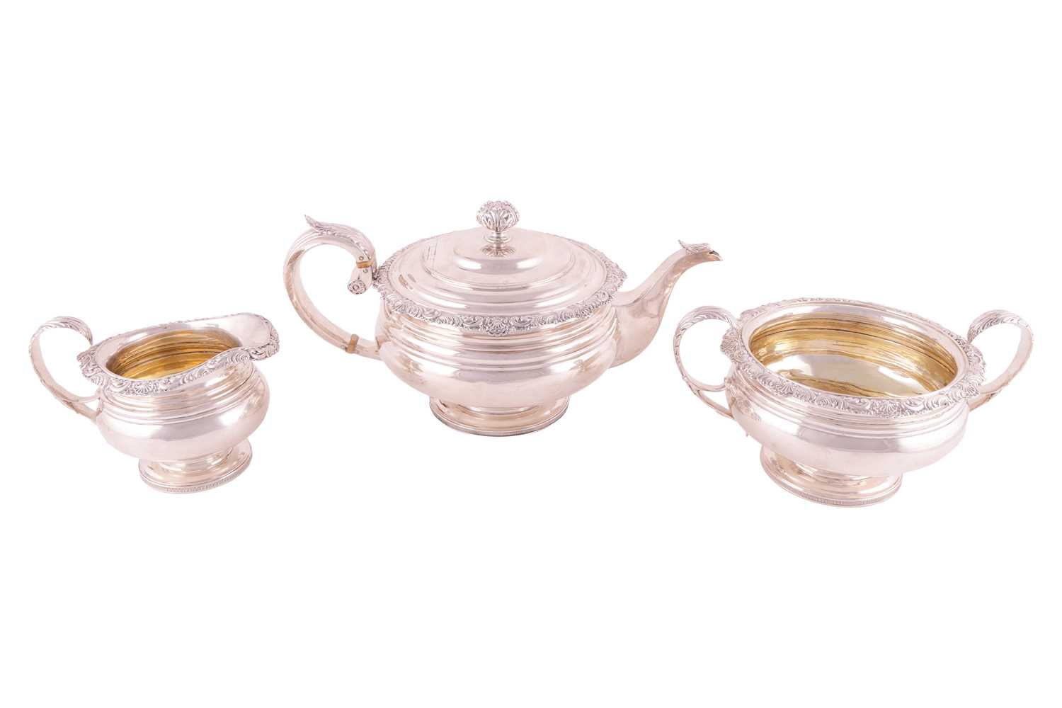 Lot 214 - A George III Scottish three piece tea set;...