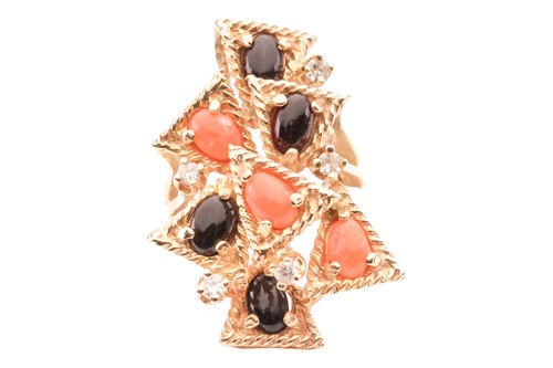 Lot 90 - A Modernist-style dress ring, set with coral...