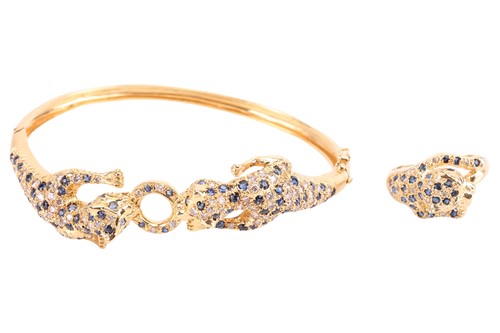 Lot A sapphire and diamond panther bracelet, with...