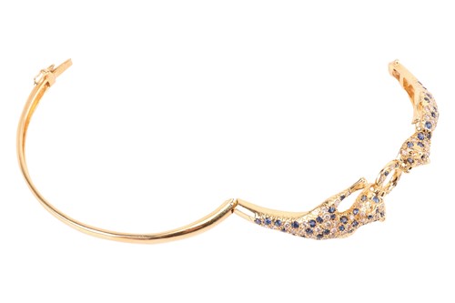 Lot 65 - A sapphire and diamond panther bracelet, with...