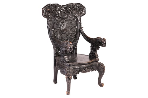 Lot A Chinese ebonised carved wood armchair, late...
