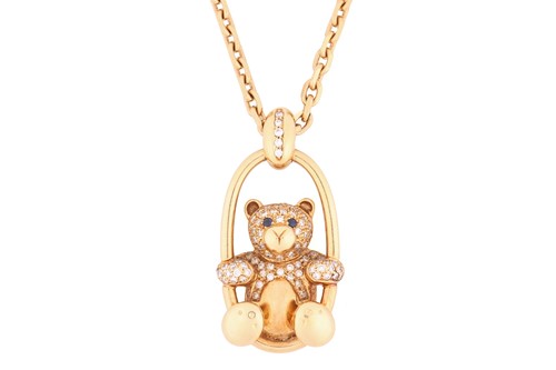 Lot A gem-set teddy bear pendant on chain,...