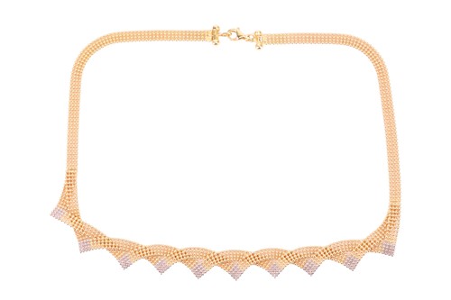 Lot 89 - A bi-colour mesh necklace in 18ct gold, the...