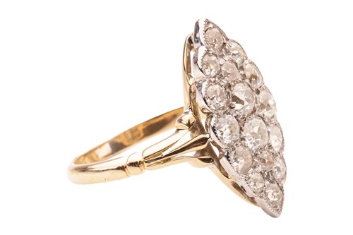 Lot 59 - A diamond cluster ring of navette shape, the...