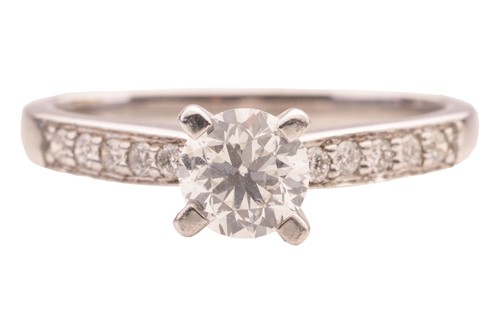 Lot A diamond ring in 18ct white gold, centred...