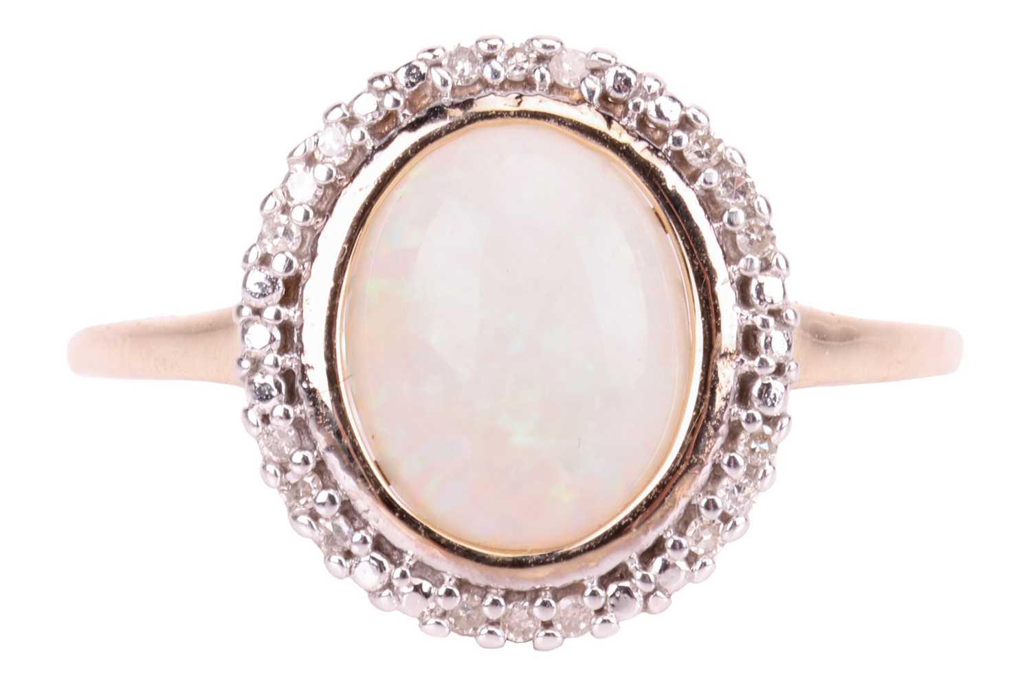 Lot 66 - An opal dress ring in 9ct yellow gold, centred...