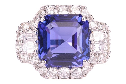 Lot A tanzanite and diamond cluster ring, centred...