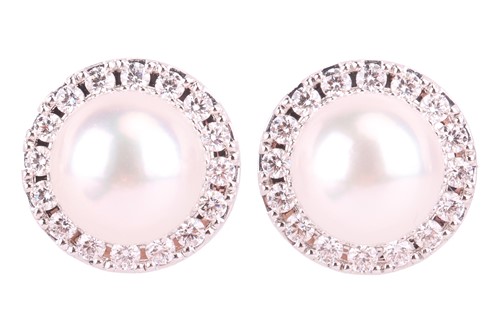 Lot A pair of pearl and diamond halo earrings by...