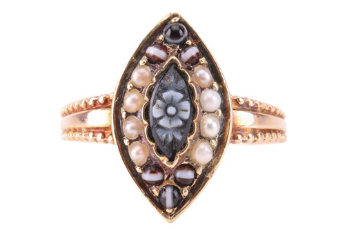 Lot 123 - A Victorian onyx cameo and seed pearl ring, in...