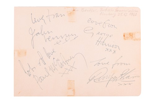 Lot 9 - The Beatles: a card signed by John Lennon,...