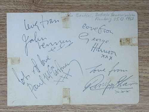 Lot 9 - The Beatles: a card signed by John Lennon,...