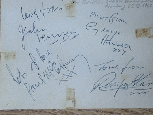 Lot 9 - The Beatles: a card signed by John Lennon,...