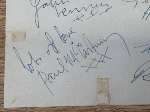 Lot 9 - The Beatles: a card signed by John Lennon,...