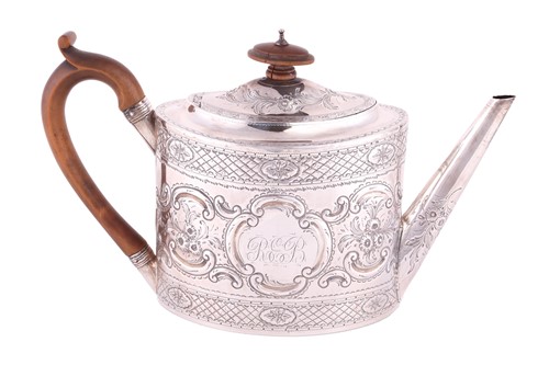 Lot 215 - A George III silver teapot with later embossed...