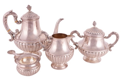 Lot 210 - A Spanish three-piece white metal tea set...