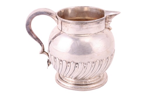 Lot 207 - A large Victorian silver jug, by Walter & John...