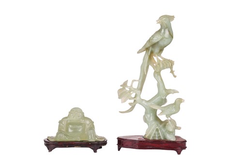 Lot 176 - A Chinese-carved jade figure of a recumbent...