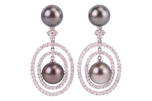 Lot A pair of Tahitian pearl and diamond drop...